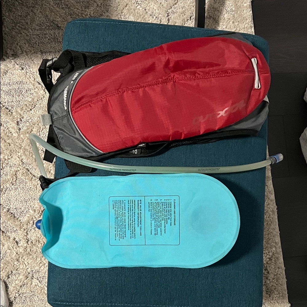 Red Hydration Backpack with Blue Reservoir
